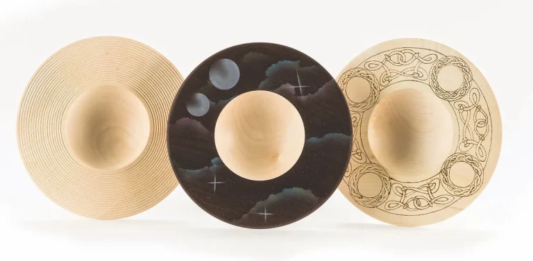 Decorative wooden bowls with unique designs.