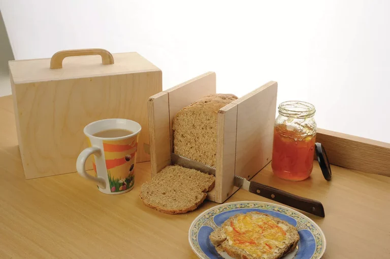 Breakfast with bread, jam, and coffee.