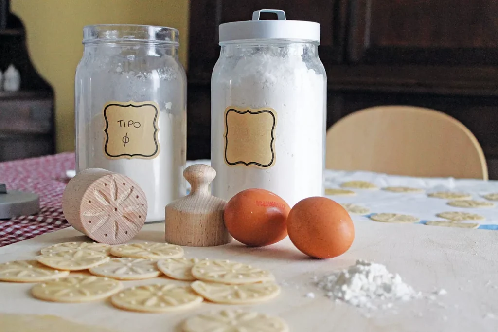 Baking ingredients and tools for homemade cookies.