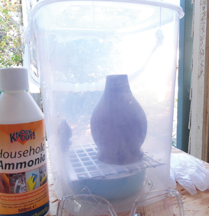 Ammonia fuming chamber for woodworking.