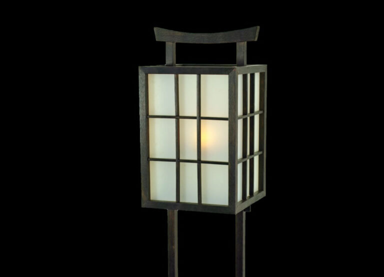 Traditional Japanese paper lantern on black background.