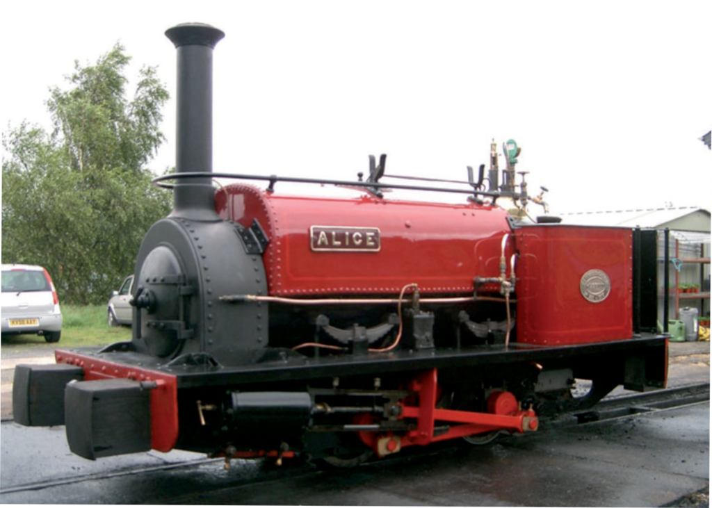 Red steam locomotive named Alice on display.