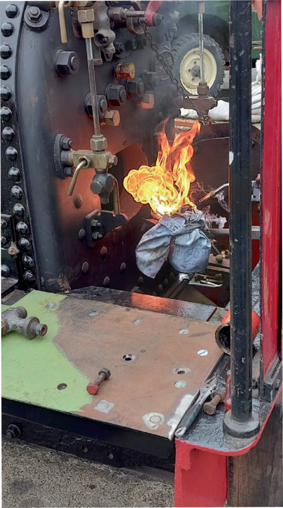 Boiler maintenance with flame under repair.