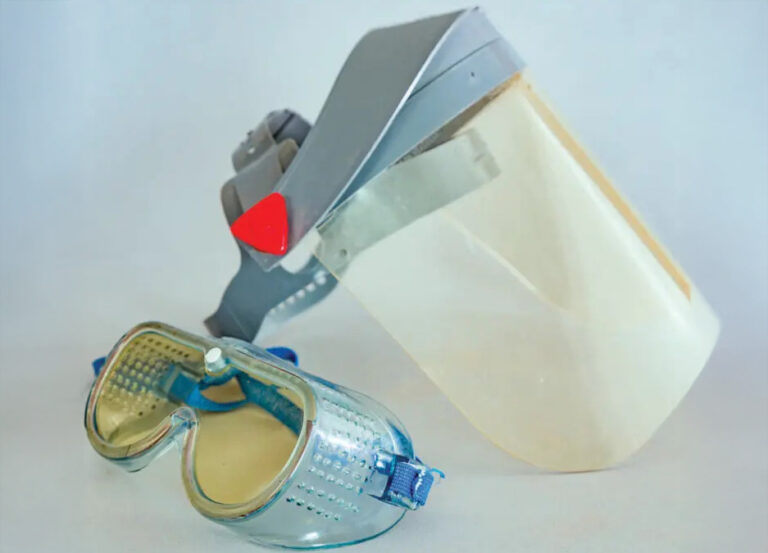 Protective face shield and goggles on display.