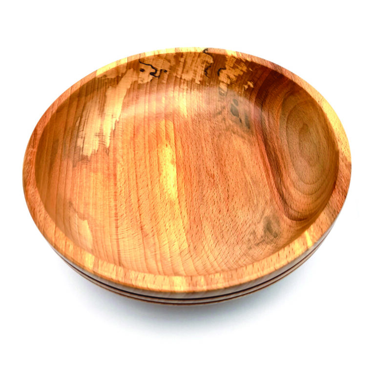 Handcrafted wooden bowl with natural grain pattern.