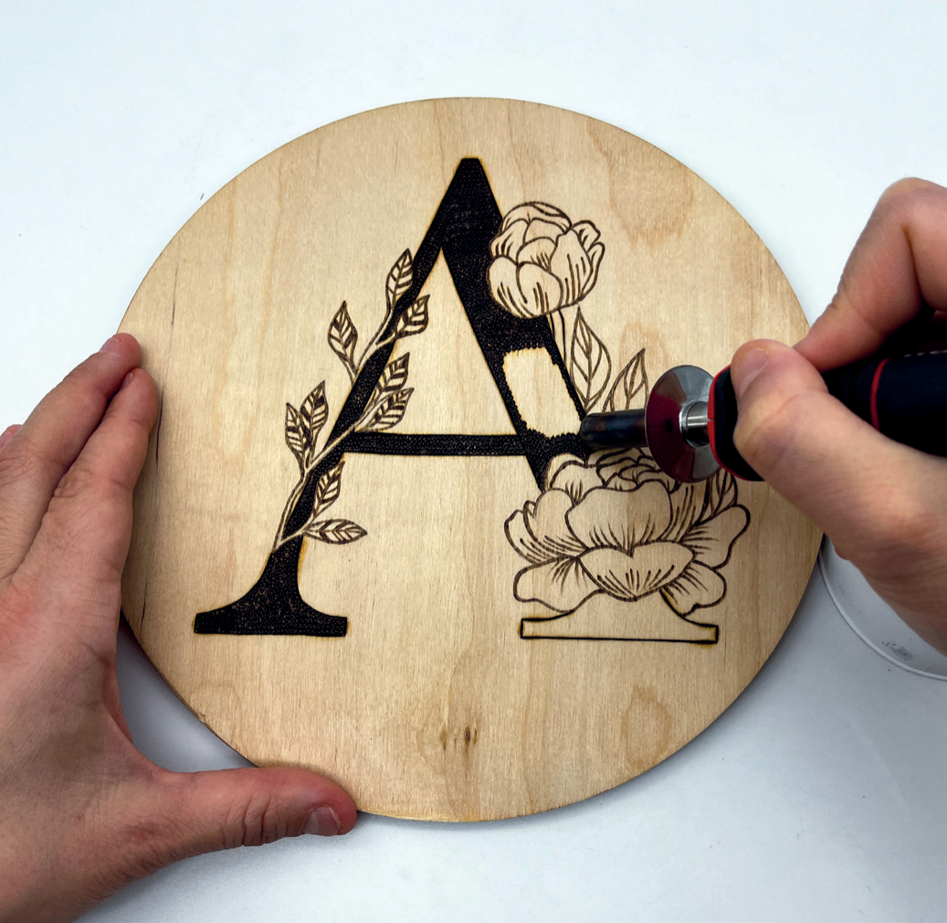 Pyrography Rocks Designs Create Vibrant Floral Art with Pyrography Techniques