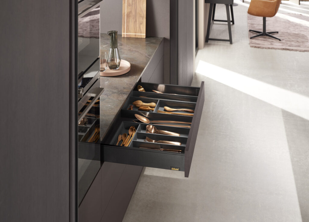 Modern kitchen drawer with cutlery insert.