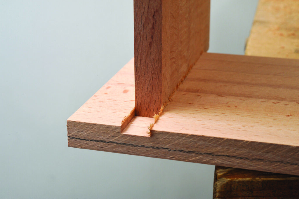 Close-up of wood joint assembly detail.