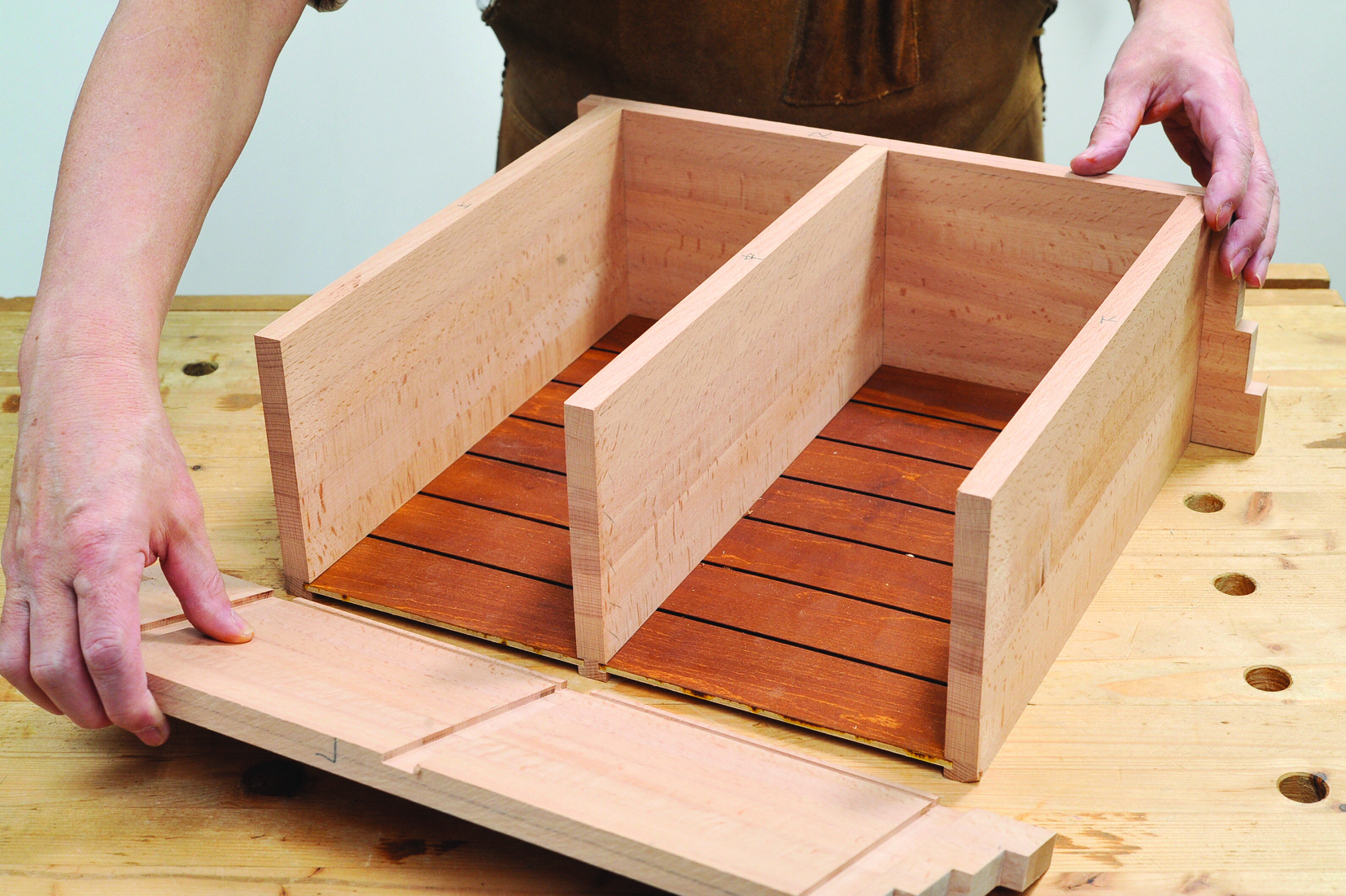 Assembling wooden drawer on a workbench