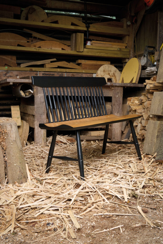 Wooden bench in workshop with shavings