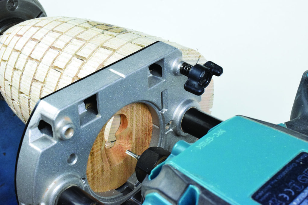 Close-up of a woodworking tool and cut wood.