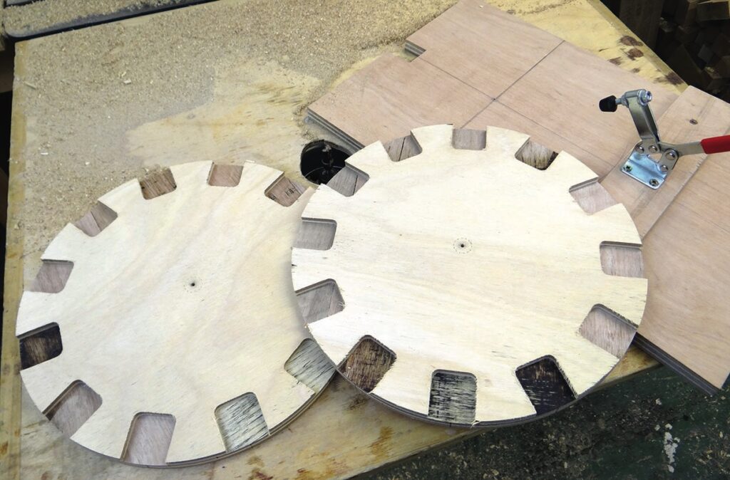 Plywood circular saw blades on a workshop table.