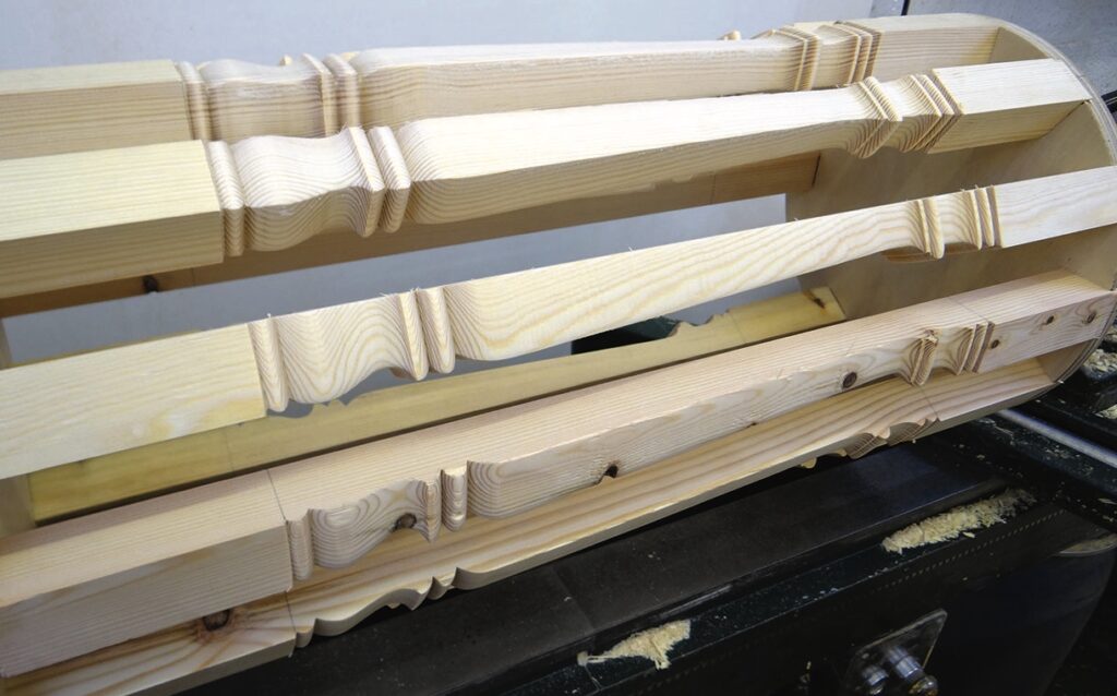 Close-up of wooden barrel staves and hoop assembly.