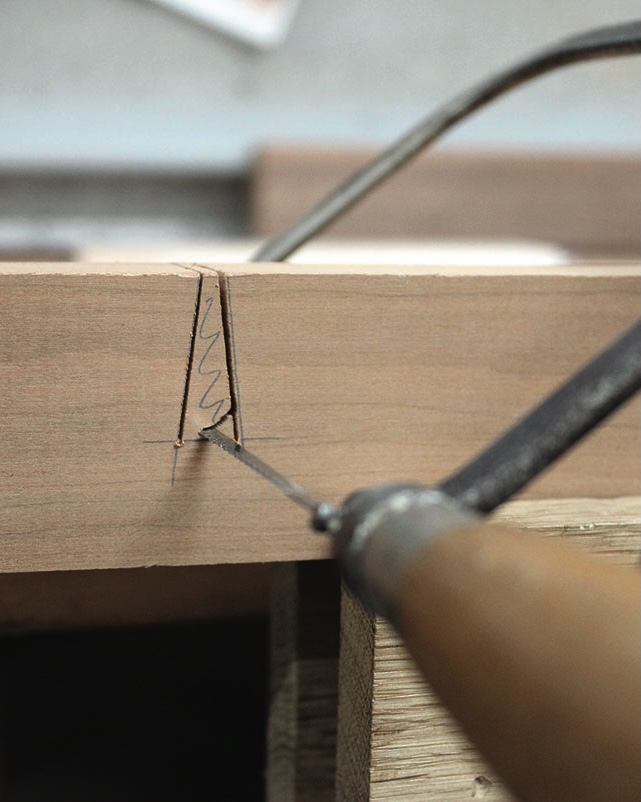 Craftsman saw cutting wood joint precisely