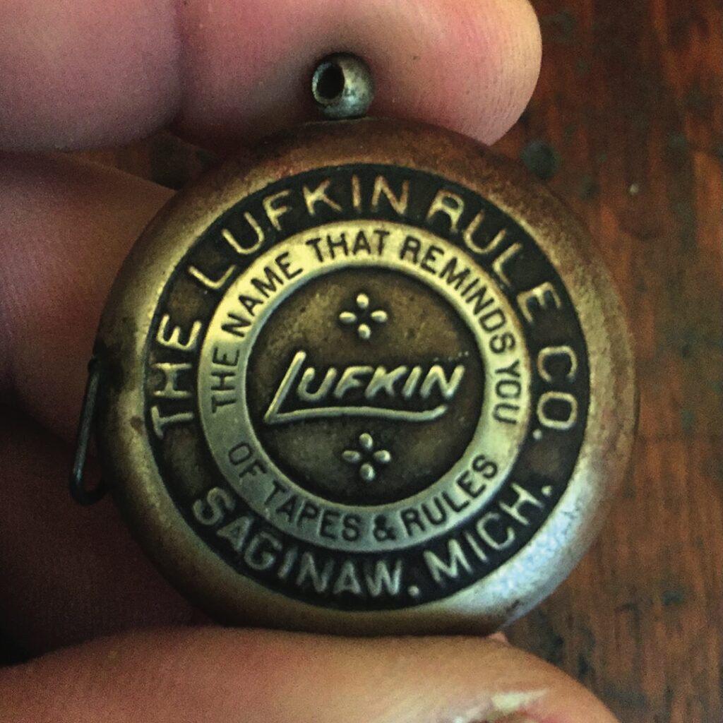 Vintage Lufkin Rule Co tape measure close-up