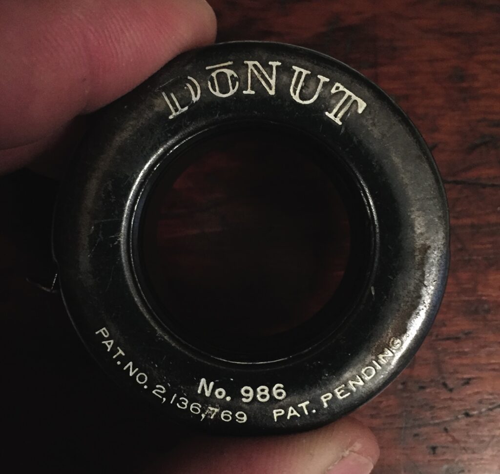 Vintage Donut film reel core close-up.
