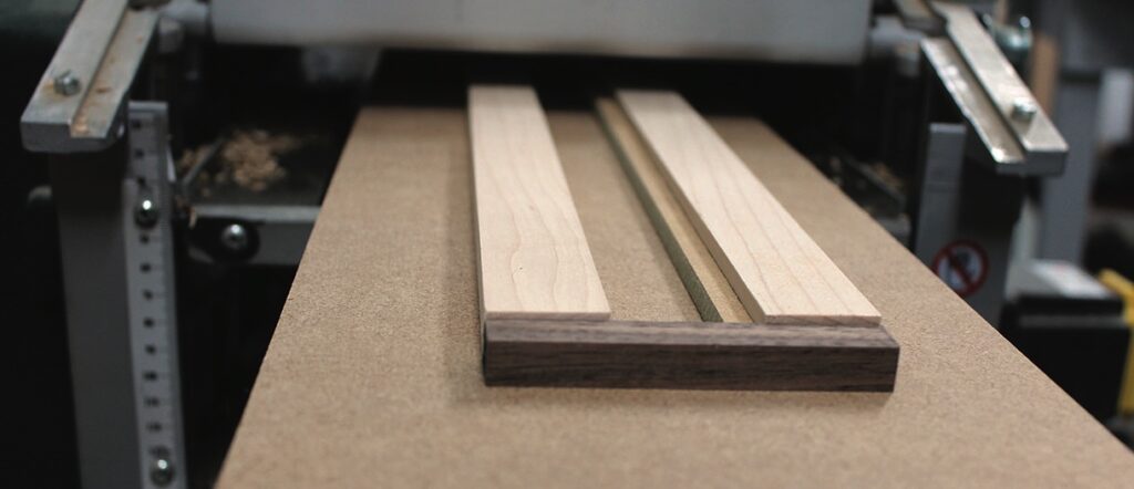 Wooden panels on industrial cutting machine