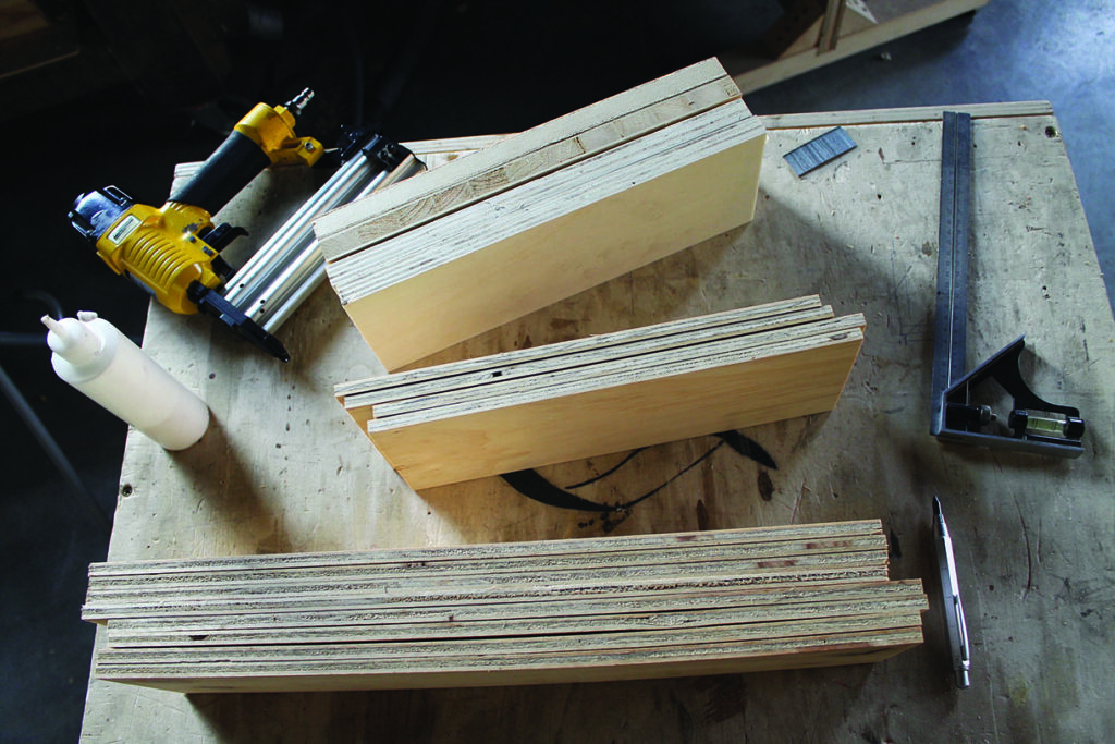 Woodworking tools and materials on workbench