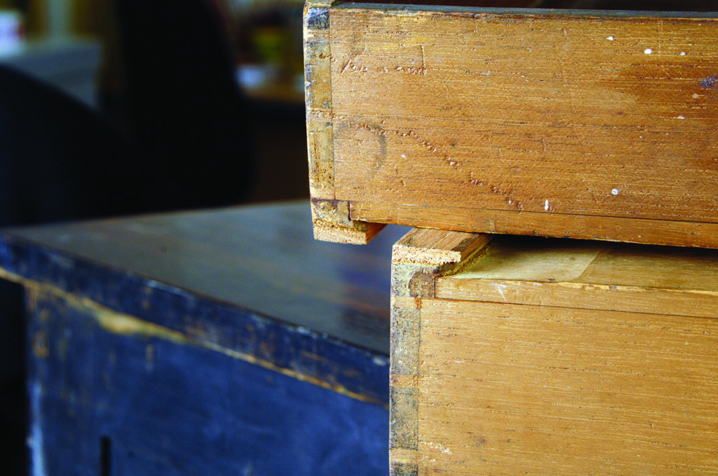 Detailed view of dovetail wood joint craftsmanship.