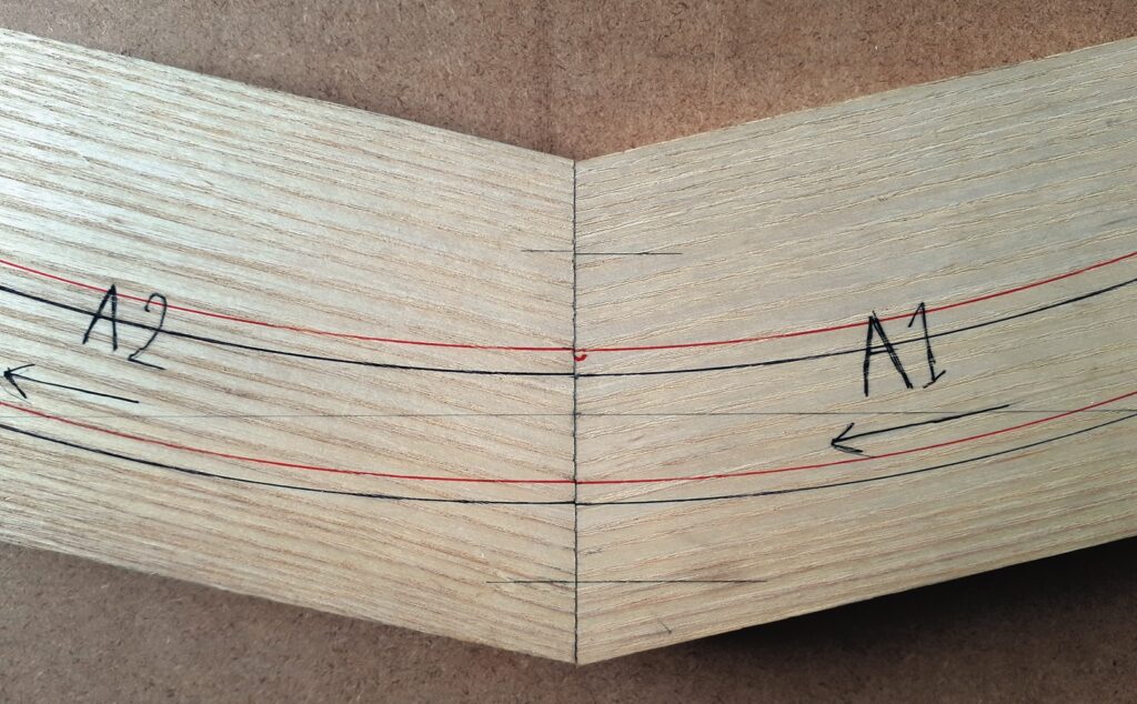 Wooden plank with marked lines and arrows