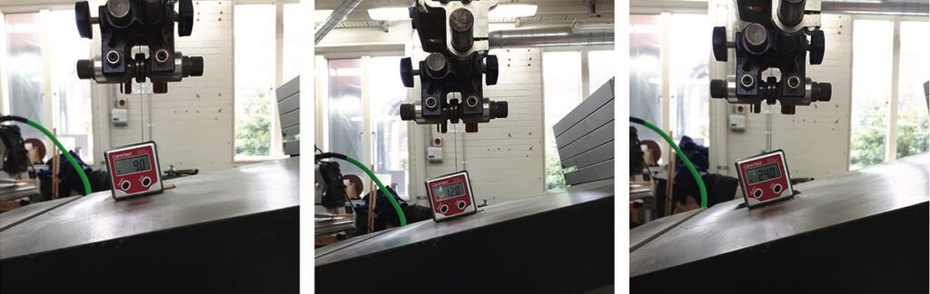 Digital angle gauge on industrial machine.