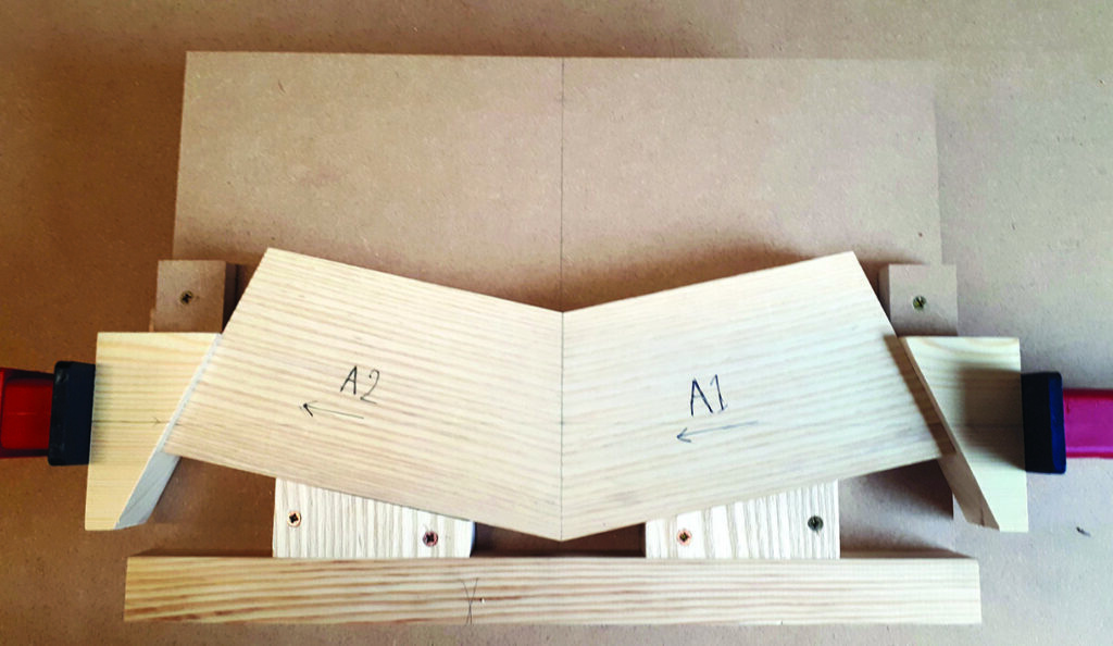 Wooden clamping jig for miter joints