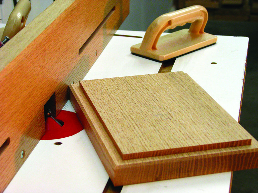 Woodworking router table with wooden board