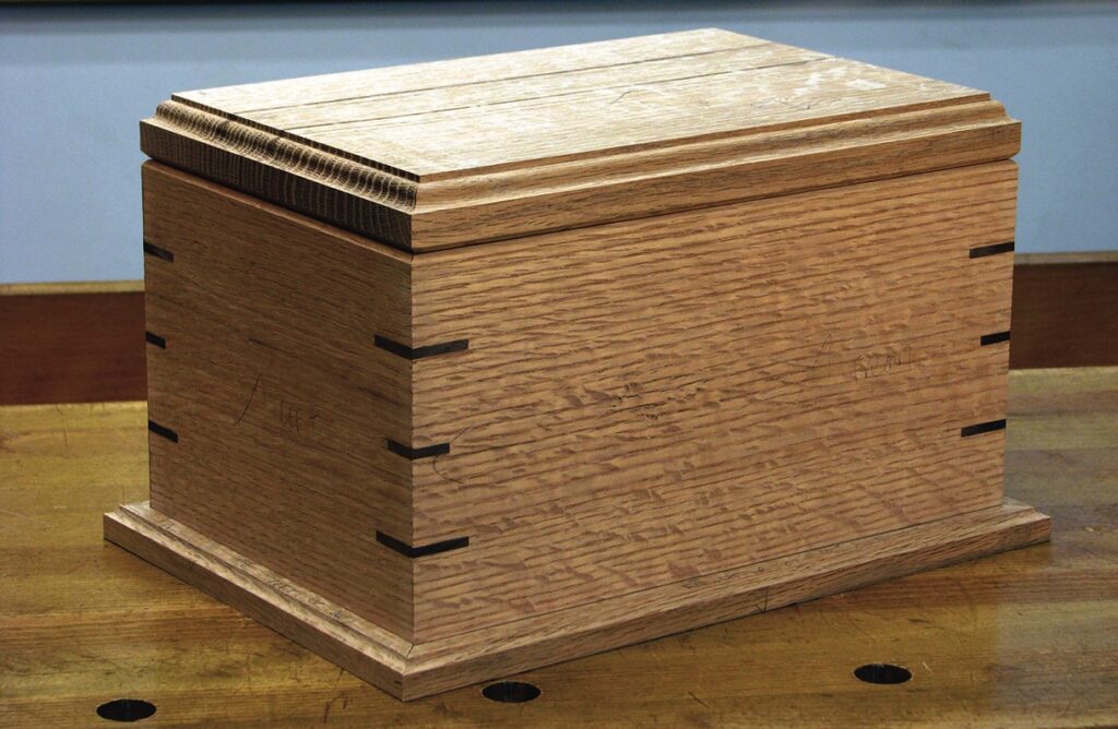 Wooden box with dovetail joints on table