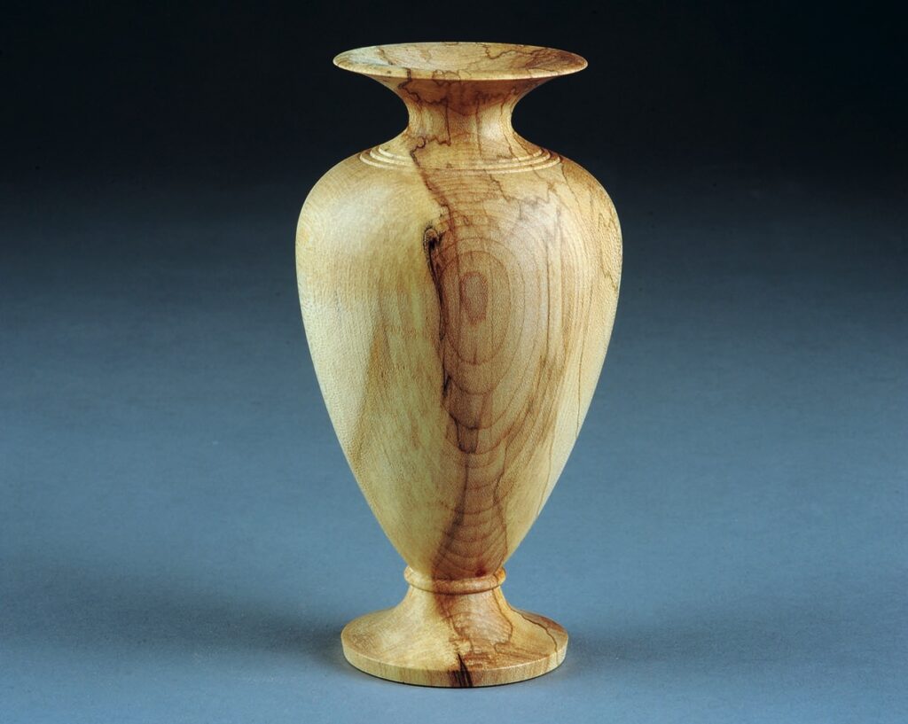 Elegant wooden urn with natural grain pattern