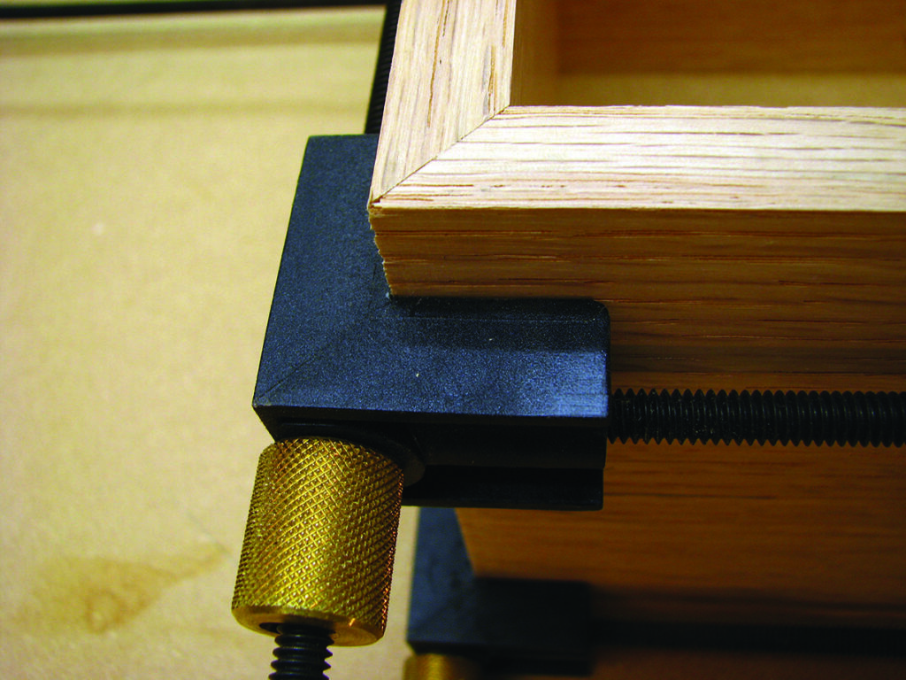 Wooden box corner with clamp tool