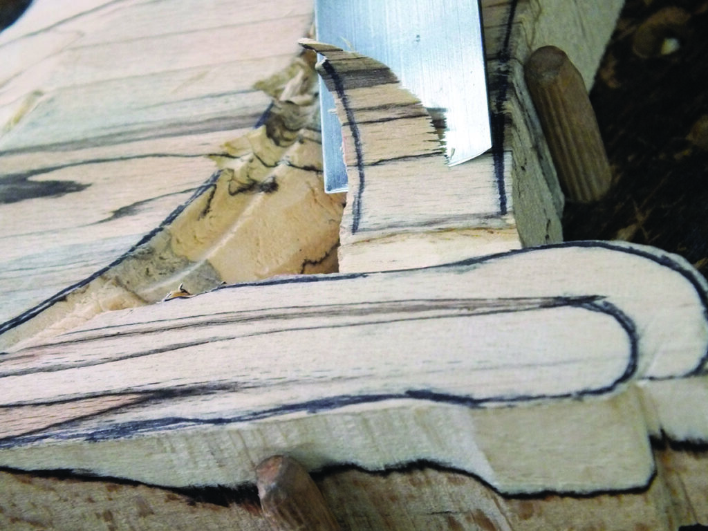 Carving wood with a precision knife