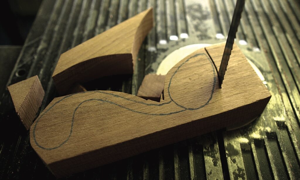 Wood being cut with a jigsaw tool