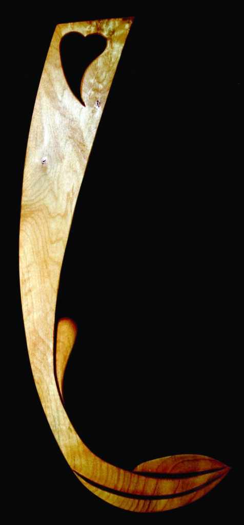 Wooden sculpture shaped like a stylised leaf