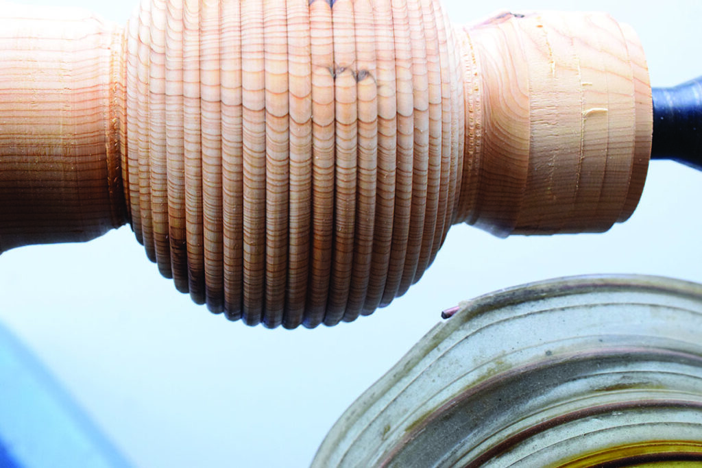 Close-up of lathe-turned wooden spindle