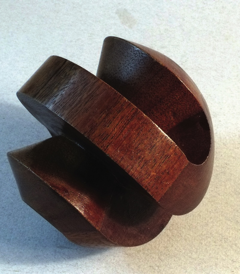 Wooden puzzle with interlocking pieces.