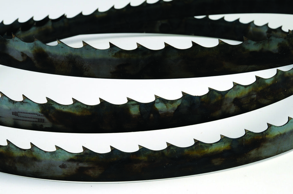 Close-up of metal band saw blades.
