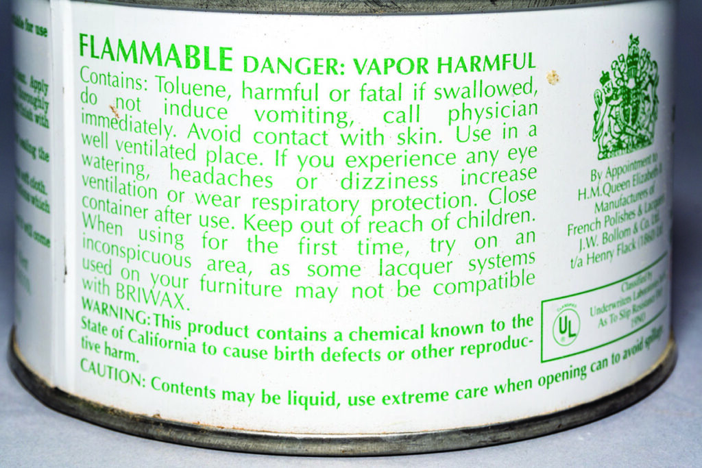 Caution label for flammable wax product.