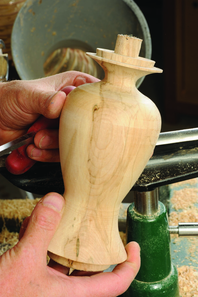 Woodturning vase creation on a lathe