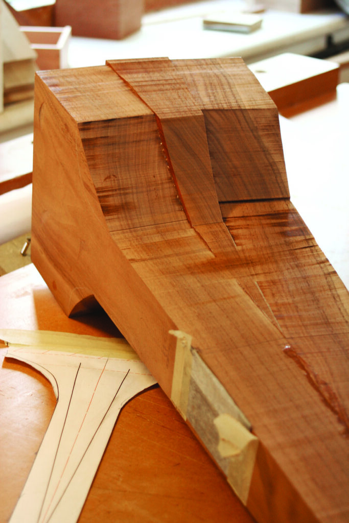 Wood crafting template on a workbench.