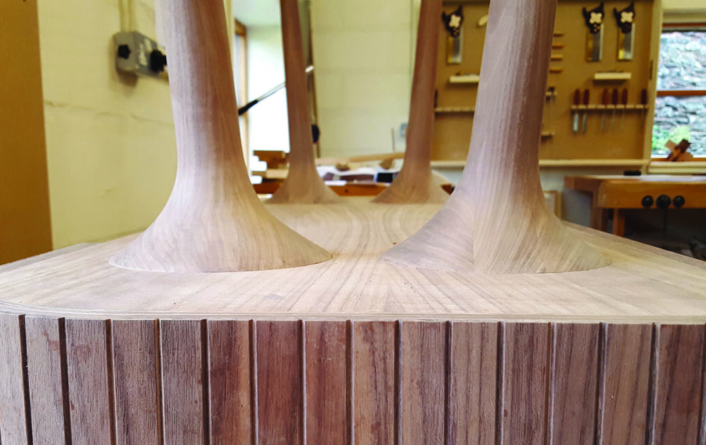 Wooden furniture legs in a workshop setting