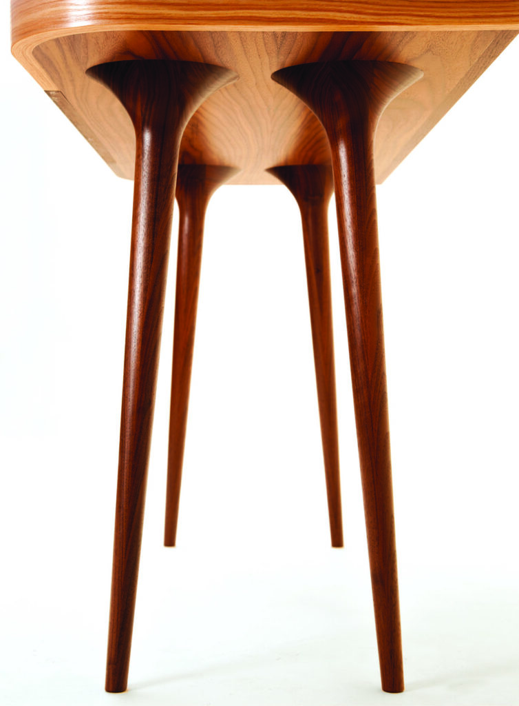 Close-up of modern wooden table legs
