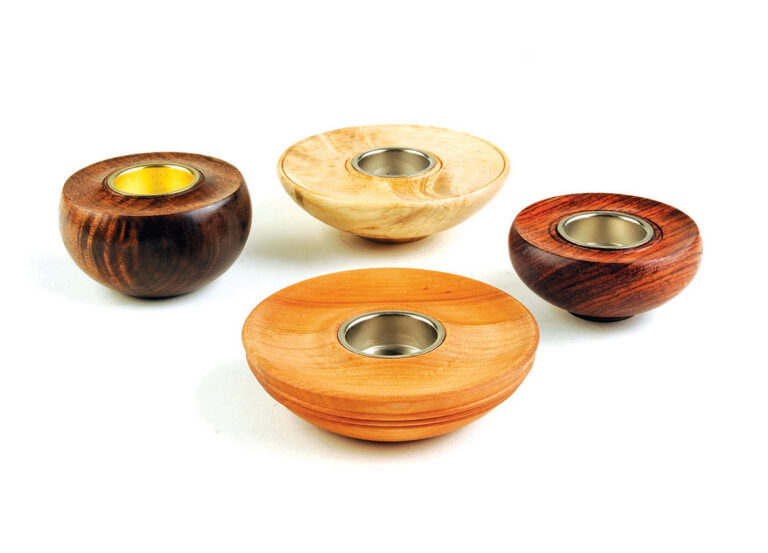 Four wooden tea light holders