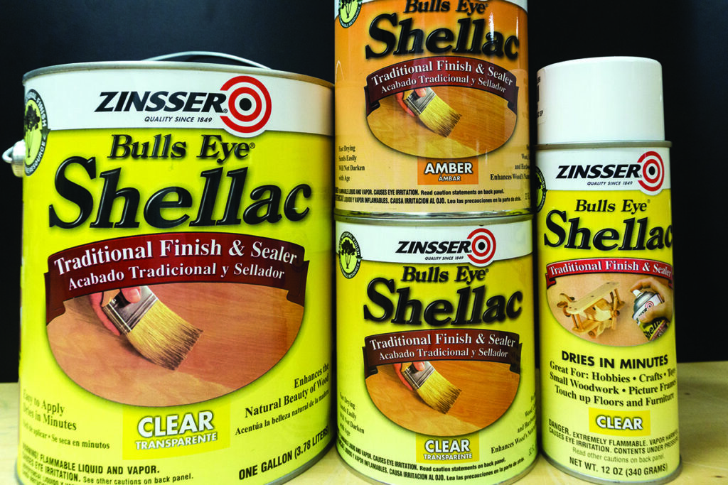 Cans of Zinsser Bulls Eye Shellac finish and sealer