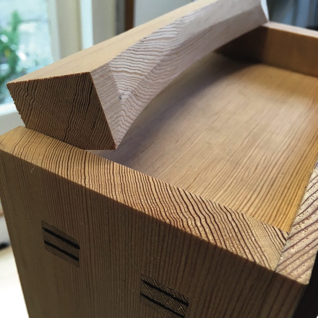 Close-up of intricate wooden furniture joinery