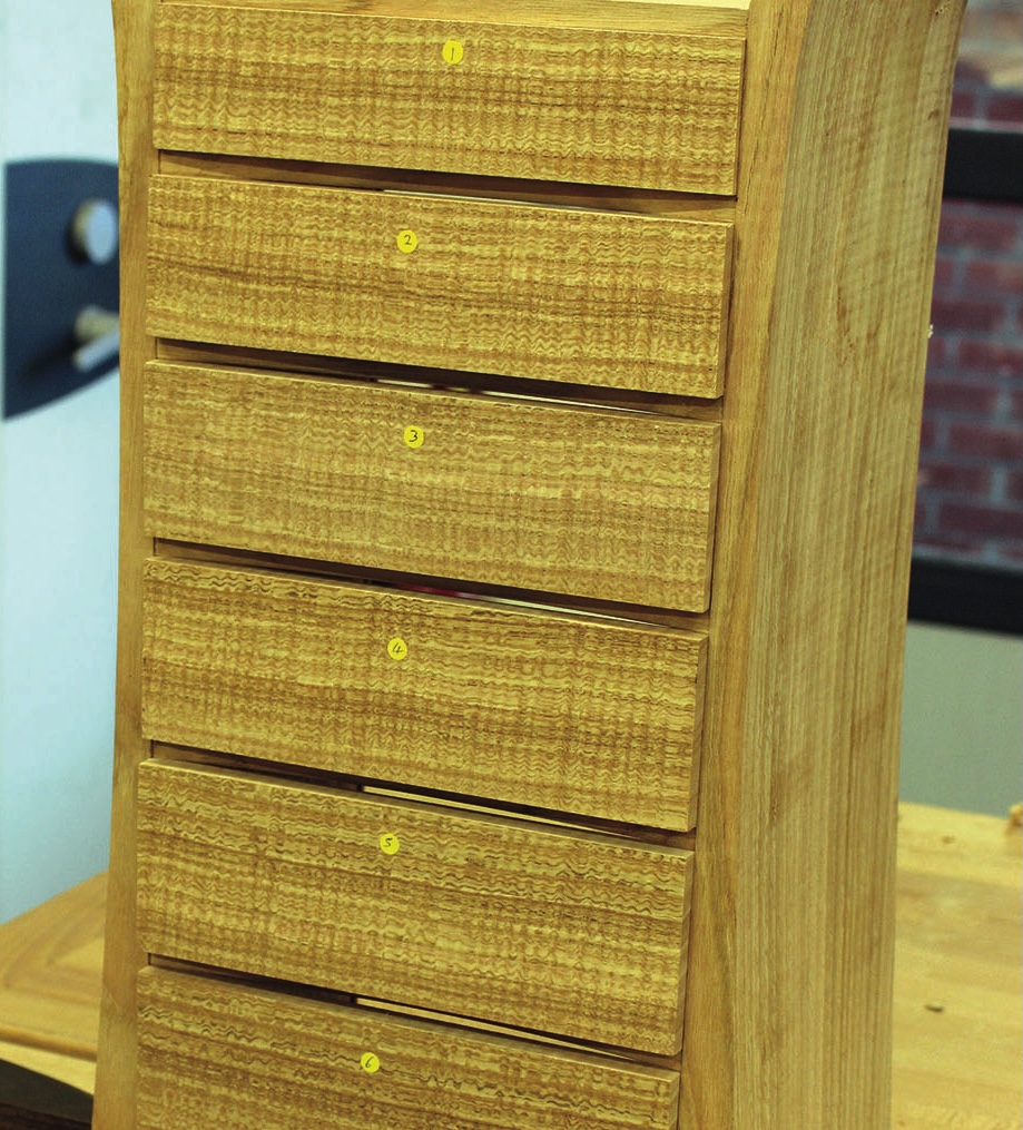 Handmade wooden chest of drawers with six compartments.