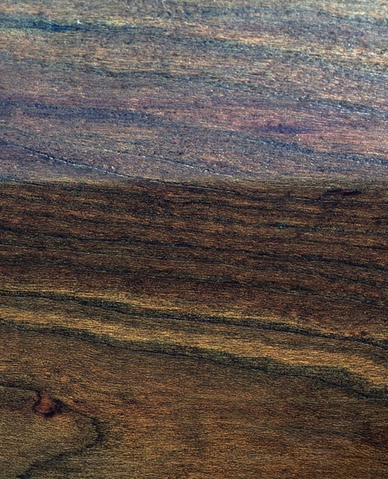 Close-up of polished wooden surface with grain patterns.
