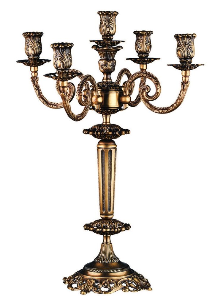 Ornate brass candelabra with intricate detailing.