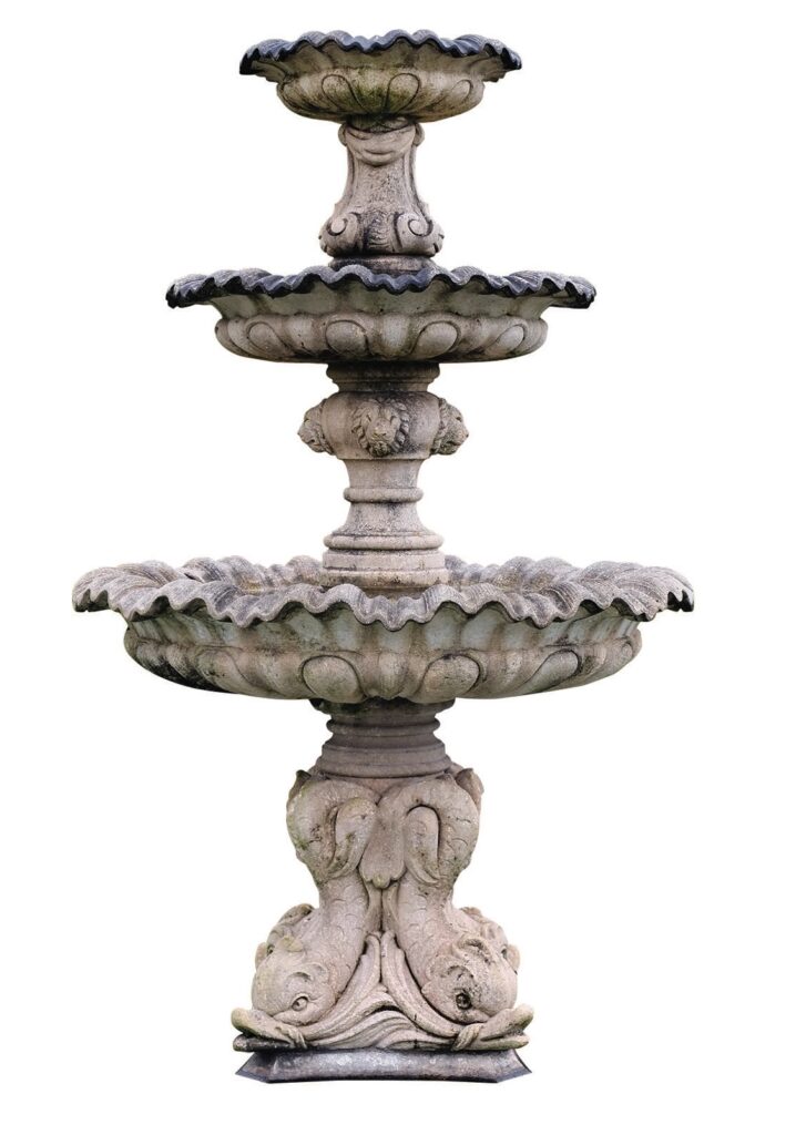 Ornate three-tier stone garden fountain