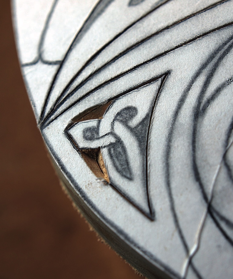 Close-up of intricate wood carving design