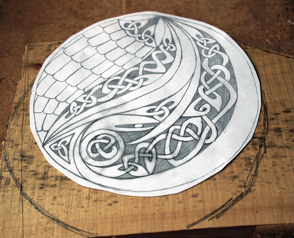Intricate Celtic knotwork design on paper.